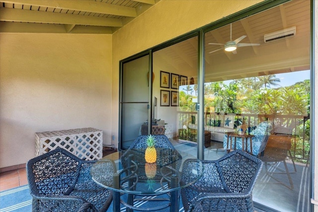 balcony featuring ceiling fan and outdoor dining area