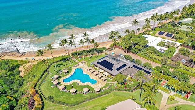 aerial view featuring a water view and a beach view