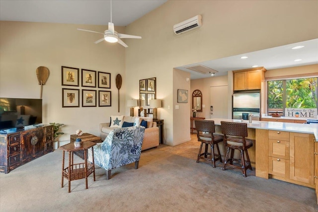 living room with light carpet, high vaulted ceiling, ceiling fan, and a wall unit AC