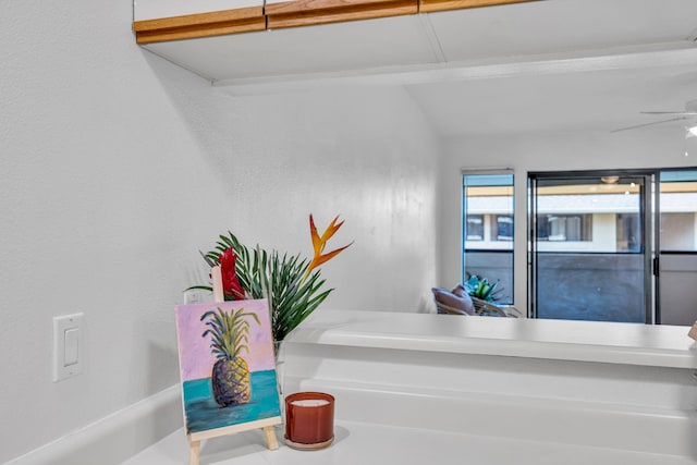 interior space featuring a ceiling fan
