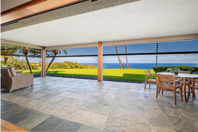 view of patio / terrace featuring a water view