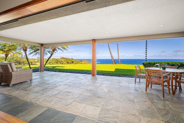 view of patio / terrace with a water view