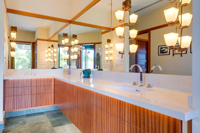 bathroom featuring vanity and a wealth of natural light