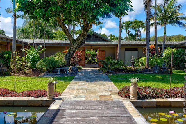 view of front of home with a front lawn