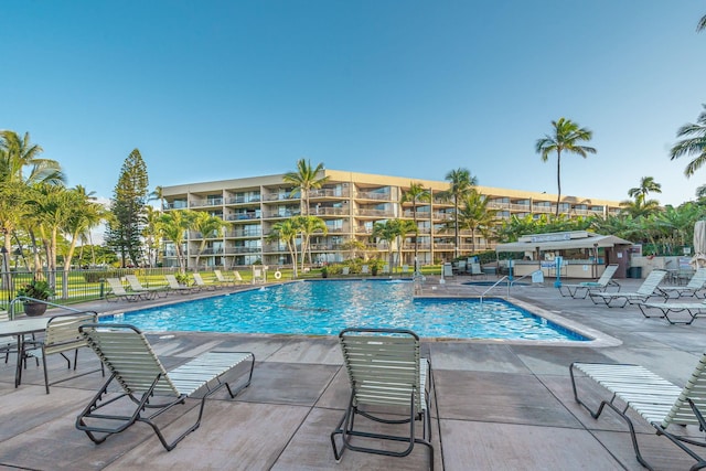 view of swimming pool with a patio area