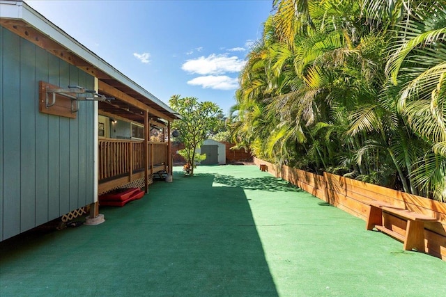 exterior space featuring a storage unit