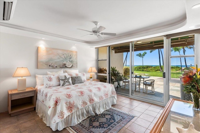 tiled bedroom with access to outside and ceiling fan