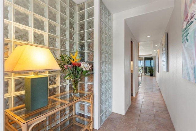 hallway featuring tile patterned floors