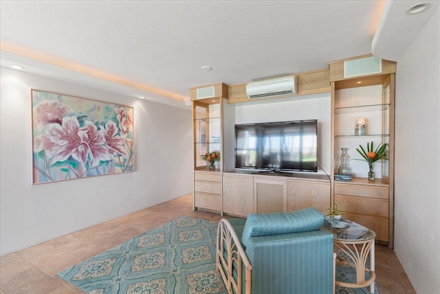 tiled living room featuring a wall unit AC