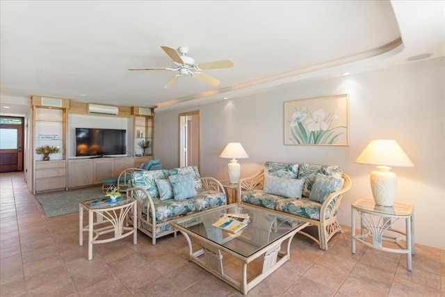 living room with an AC wall unit, ceiling fan, and light tile patterned floors