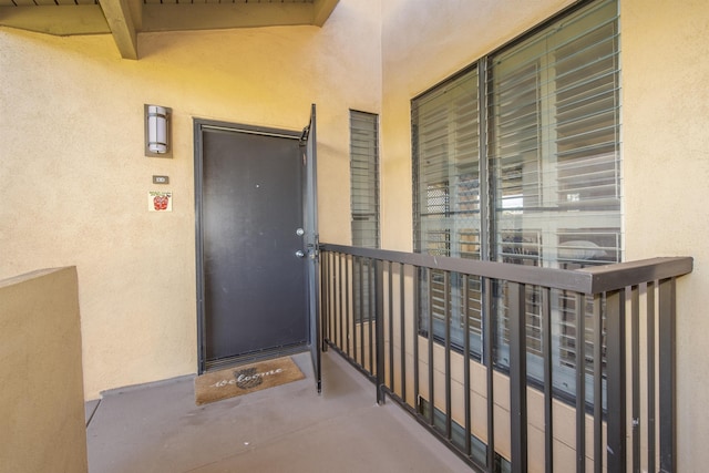 entrance to property featuring a balcony