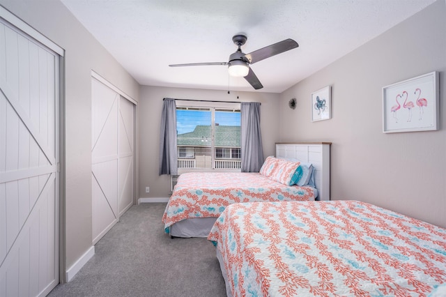 bedroom featuring ceiling fan and carpet flooring