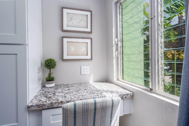 bedroom featuring built in desk