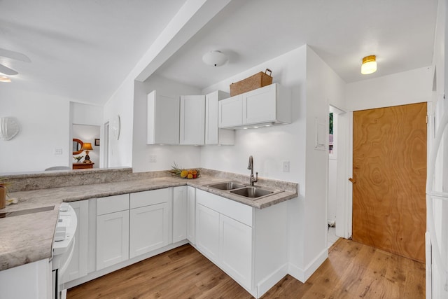 317 Kenolio Rd, Kihei, HI 96753 - kitchen featuring white cabinetry, light countertops, a sink, light wood finished floors, and ceiling fan
