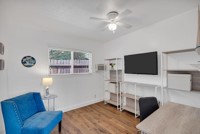 317 Kenolio Rd, Kihei, HI 96753 - sitting room featuring baseboards, wood finished floors, and a ceiling fan