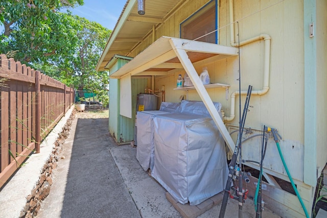 317 Kenolio Rd, Kihei, HI 96753 - exterior space with washer / clothes dryer and fence
