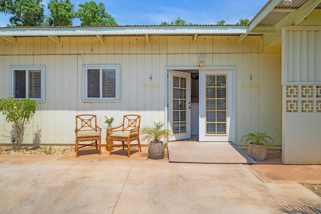 317 Kenolio Rd, Kihei, HI 96753 - property entrance with metal roof and a patio area