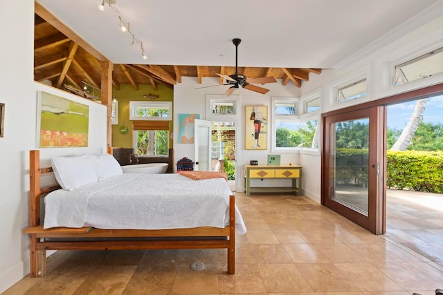 tiled bedroom with ceiling fan, access to exterior, track lighting, and lofted ceiling with beams