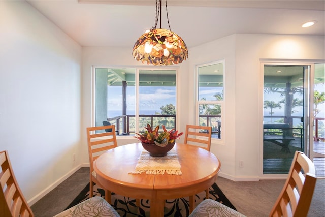 view of carpeted dining area