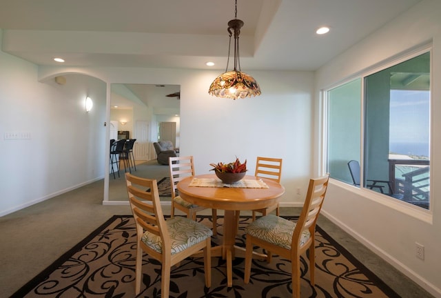 dining room featuring carpet