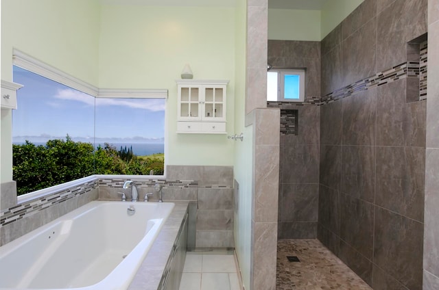 bathroom featuring tile patterned floors and plus walk in shower