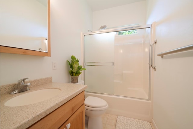 full bathroom with enclosed tub / shower combo, vanity, toilet, and tile patterned floors