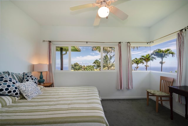 bedroom with dark carpet and ceiling fan