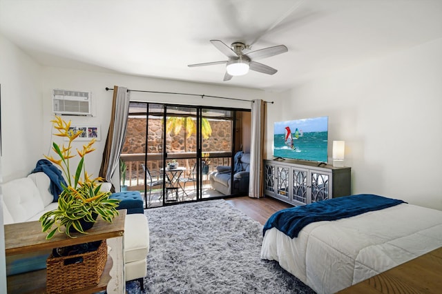 bedroom with access to exterior, hardwood / wood-style flooring, ceiling fan, and a wall mounted AC