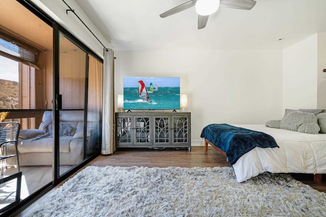 bedroom featuring hardwood / wood-style floors and ceiling fan