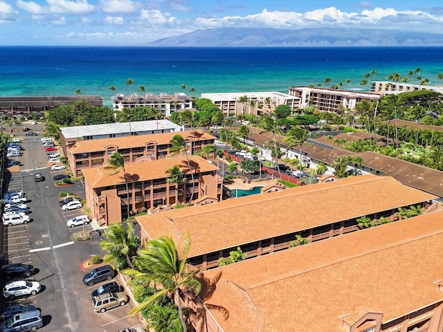 bird's eye view with a water view and a view of the beach