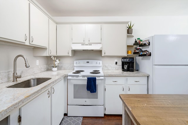 kitchen featuring light stone counters, dark hardwood / wood-style floors, sink, white cabinets, and white appliances