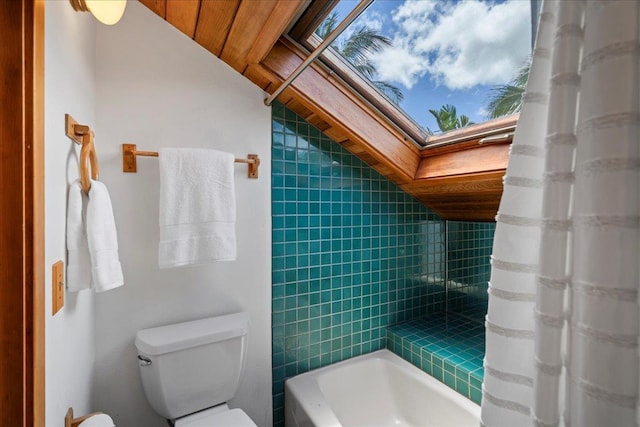 41 Pihaa St, Lahaina, HI 96761 - bathroom with tile walls, shower / tub combo with curtain, and a skylight