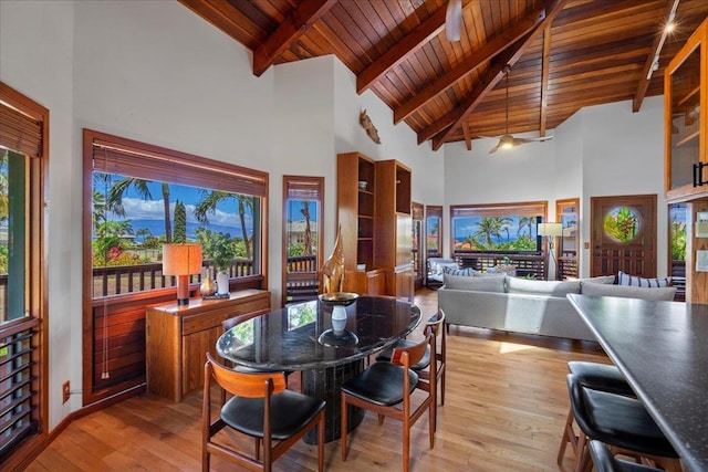 41 Pihaa St, Lahaina, HI 96761 - dining space with high vaulted ceiling, a wood ceiling with exposed beams, and light wood-type flooring