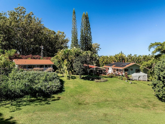 view of yard with a sunroom