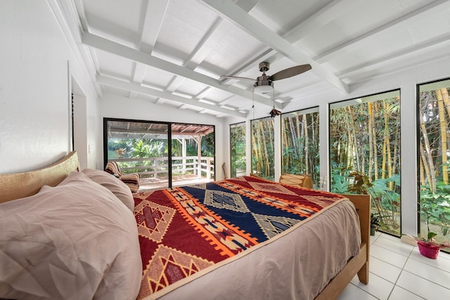 tiled bedroom with vaulted ceiling with beams, ceiling fan, and access to exterior