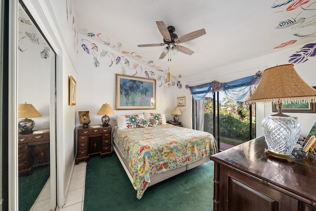 carpeted bedroom with access to exterior and ceiling fan