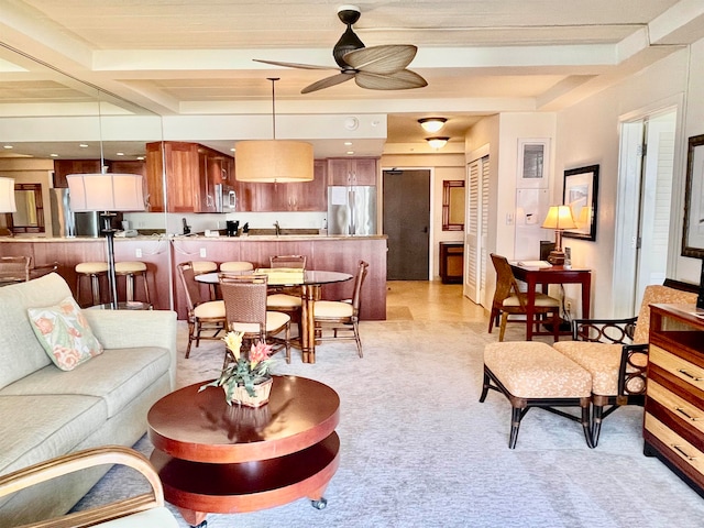 living room with ceiling fan
