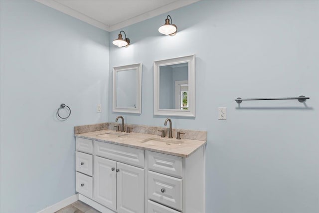 bathroom featuring tile patterned floors, vanity, and crown molding