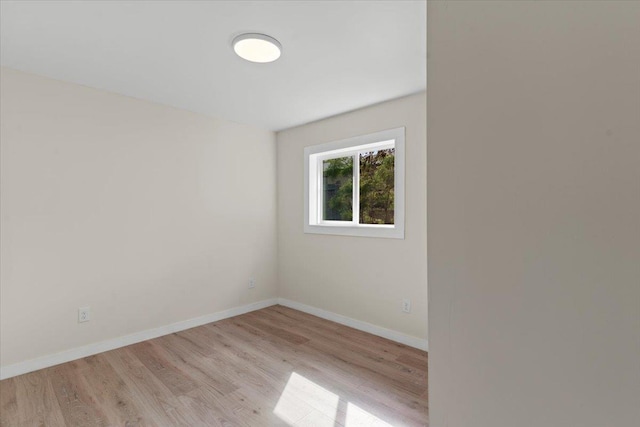 empty room featuring light hardwood / wood-style floors