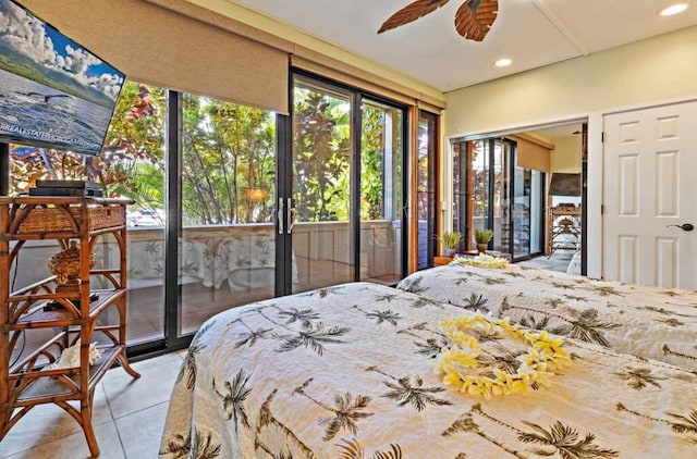 bedroom featuring access to exterior and light tile patterned floors