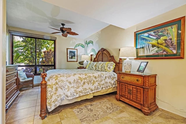 tiled bedroom with ceiling fan