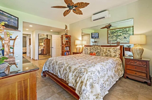 bedroom with a closet, ceiling fan, and an AC wall unit