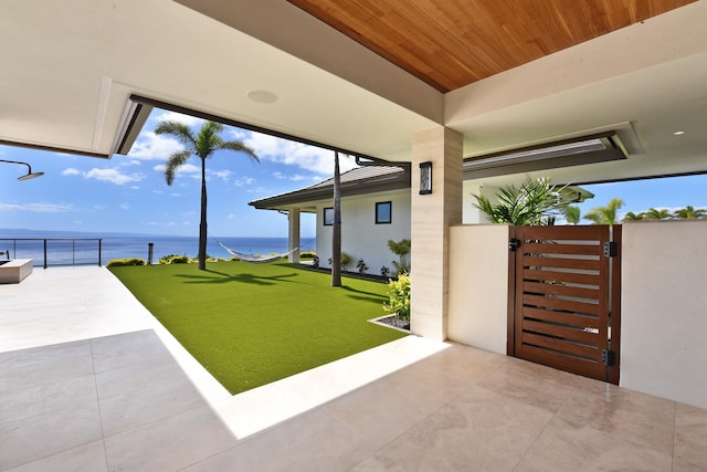 view of patio / terrace with a water view