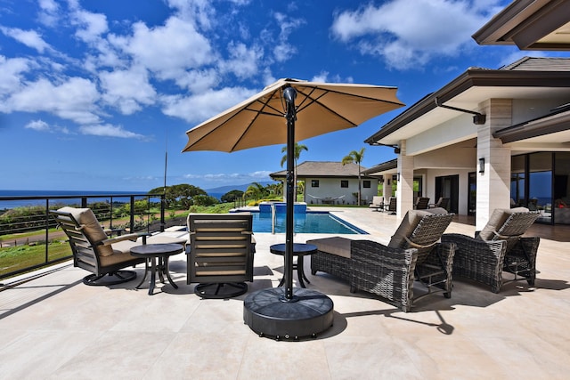 view of pool featuring a patio