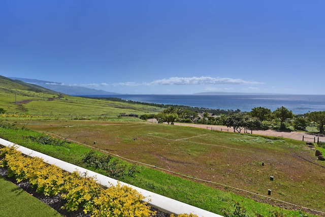 exterior space with a water view and a rural view