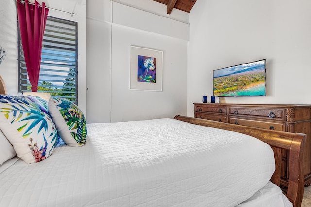 bedroom with beamed ceiling