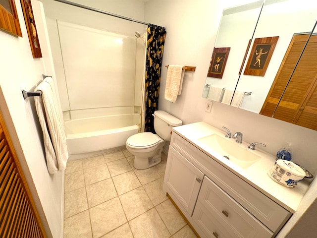 full bathroom featuring tile patterned floors, vanity, toilet, and shower / tub combo with curtain