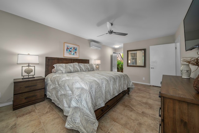 bedroom featuring a wall mounted AC and ceiling fan