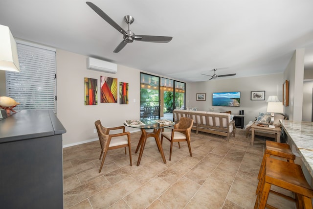 dining space with an AC wall unit and ceiling fan