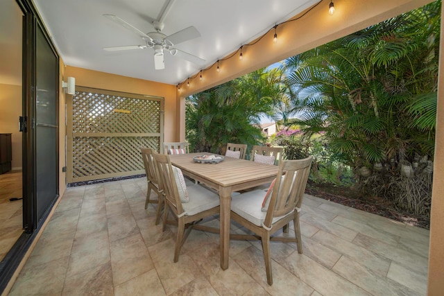 exterior space featuring ceiling fan